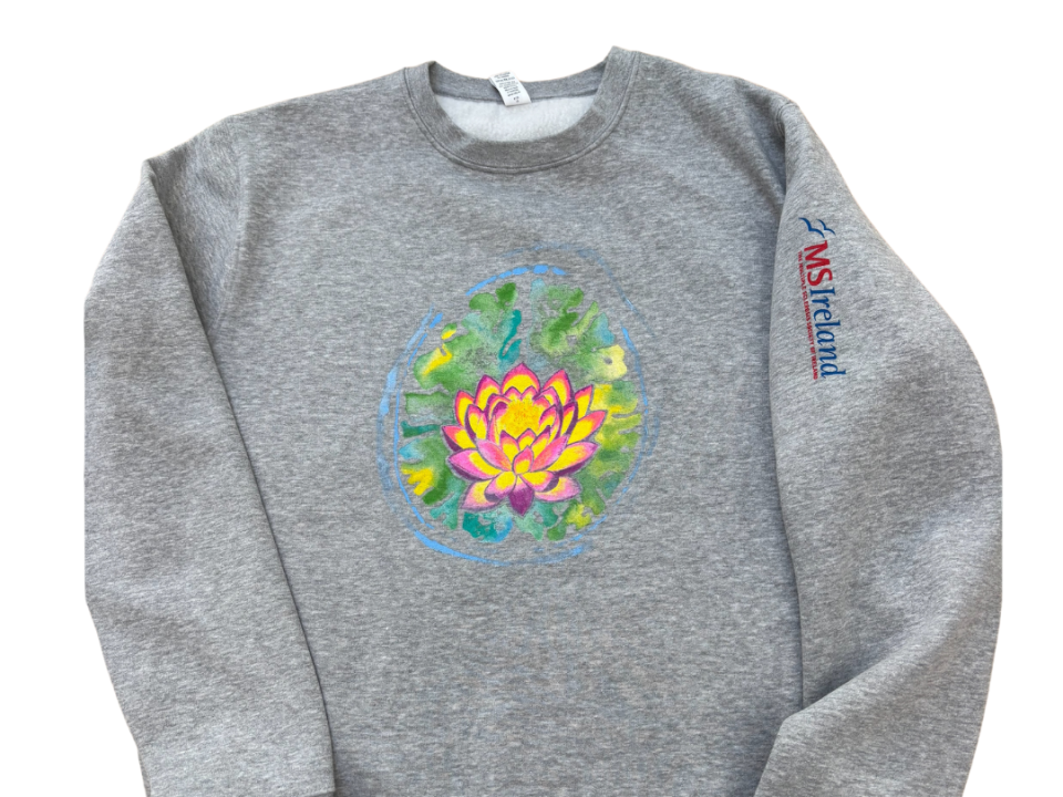 Logo design by Ruth Burden titled 'Lotus Brain Scan'—a symbolic lotus flower over a brain scan image, representing hope and resilience in the MS community.