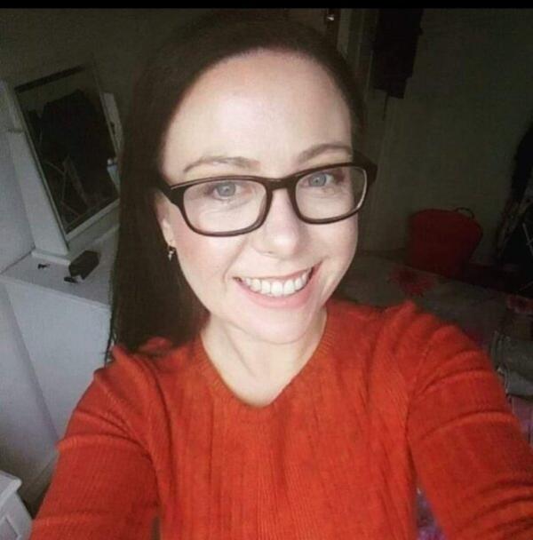 Person wearing a red jumper 