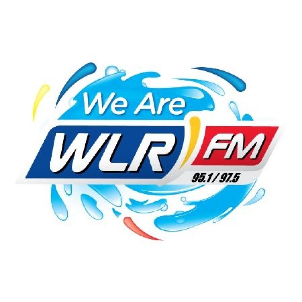 We Are WLR FM logo, featuring blue and red text with the radio frequencies 95.1 / 97.5, surrounded by water splash graphics